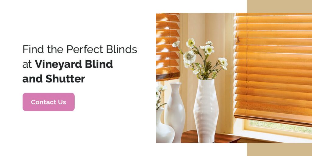 vase with flowers in front of blinds- vineyard blind and shutter