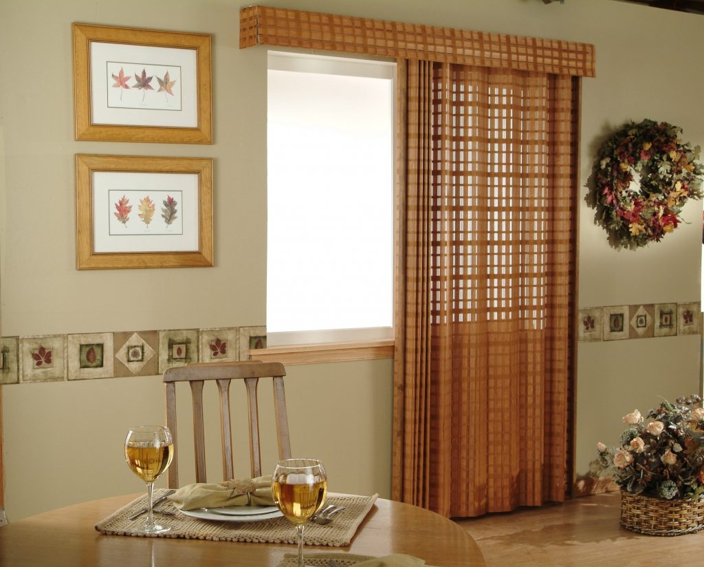 Motorized vertical blinds for sliding doors