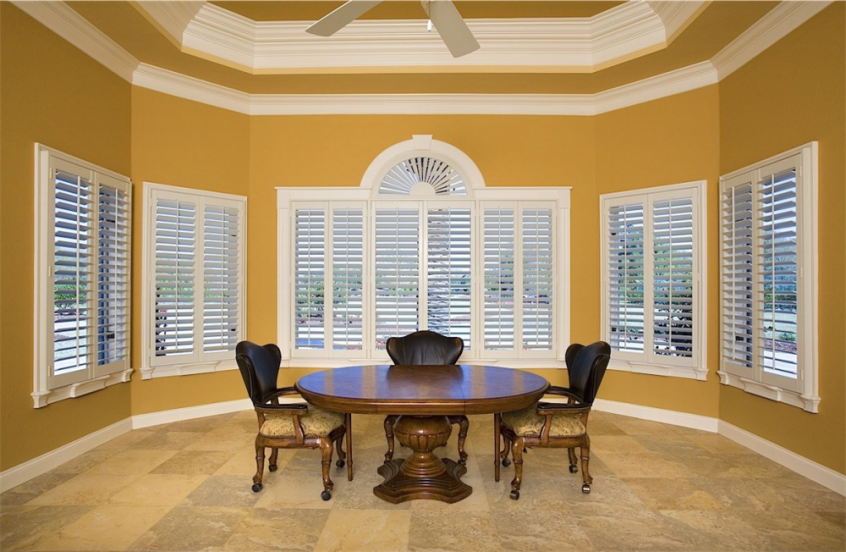 White Shutters in dining room - Southern California Window Coverings
